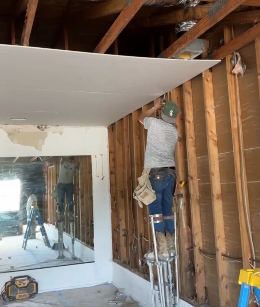 Drywall repair and finishing on residential interior wall